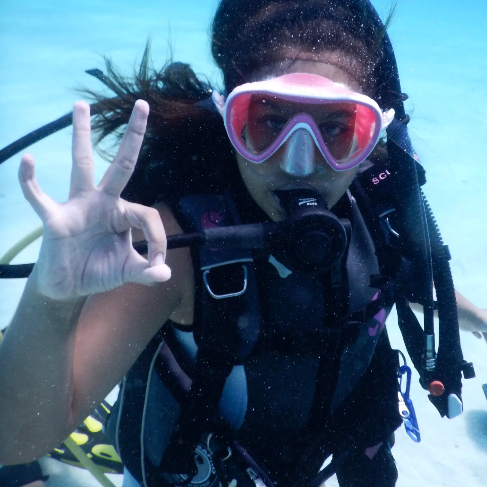 a person wearing sunglasses taking a selfie