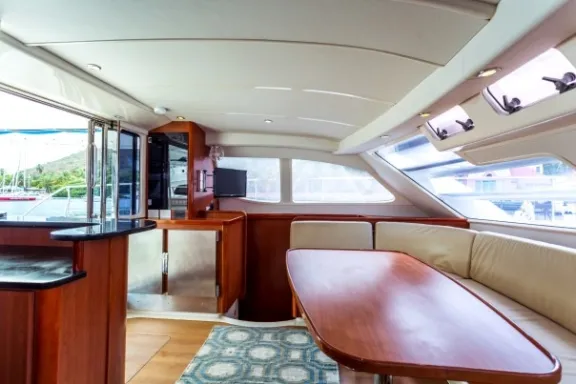 a room filled with furniture and a large window