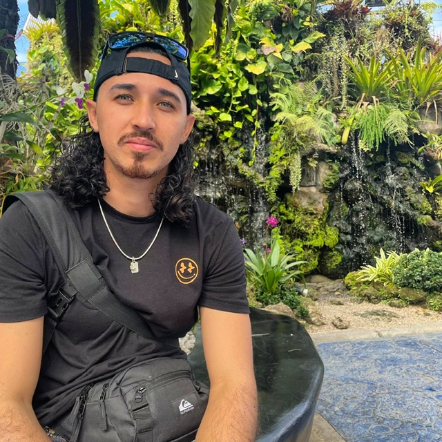 a man wearing a blue shirt